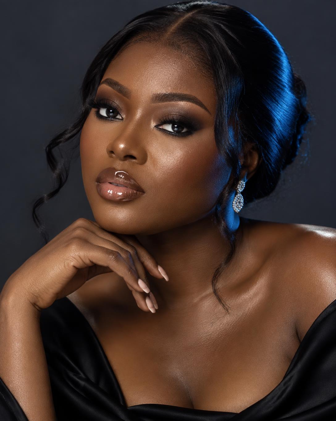 Smoky eye makeup and glossy lips in an editorial beauty portrait
